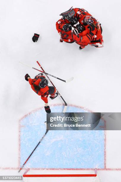 Jocelyne Larocque, Marie-Philip Poulin, Sarah Nurse, Renata Fast and Ann-Renee Desbiens of Team Canada celebrate after defeating Team United States...