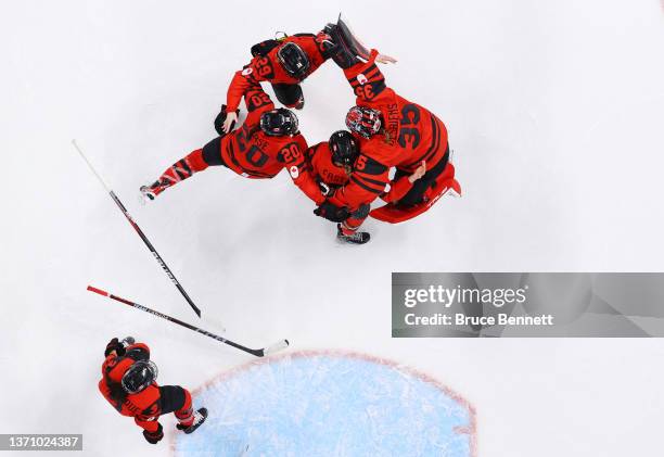 Jocelyne Larocque, Marie-Philip Poulin, Sarah Nurse, Renata Fast and Ann-Renee Desbiens of Team Canada celebrate after defeating Team United States...