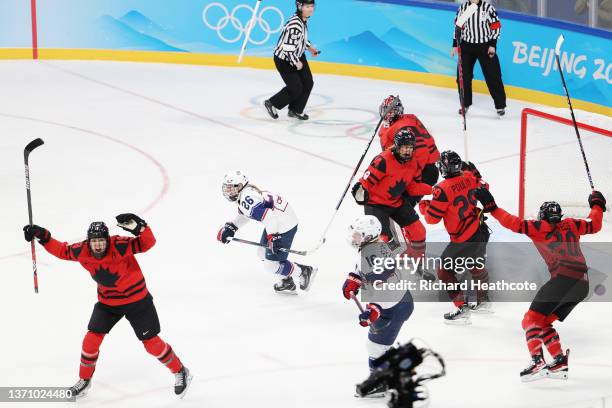 Brianne Jenner, Marie-Philip Poulin, Sarah Nurse, Renata Fast and Ann-Renee Desbiens of Team Canada celebrate as Kendall Coyne Schofield and Hayley...