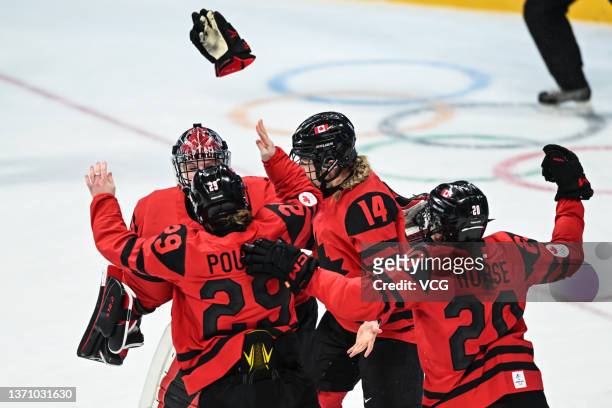 Players of Team Canada celebrate their victory during the Women's Ice Hockey Gold Medal match between Team Canada and Team United States on Day 13 of...
