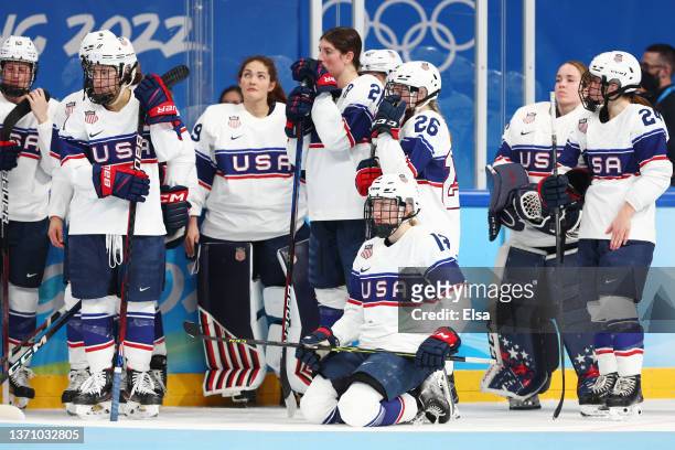 Team United States players look on after their 3-2 loss in the Women's Ice Hockey Gold Medal match between Team Canada and Team United States on Day...