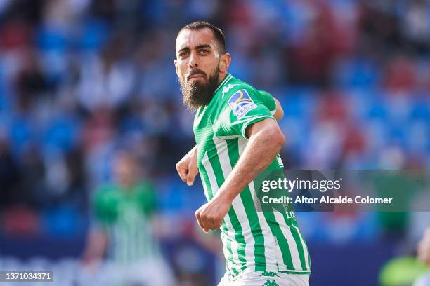 Borja Iglesias of Real Betis celebrates after scoring goal his team mate Nabil Fekir during the LaLiga Santander match between Levante UD and Real...