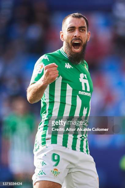 Borja Iglesias of Real Betis celebrates after scoring goal his team mate Nabil Fekir during the LaLiga Santander match between Levante UD and Real...