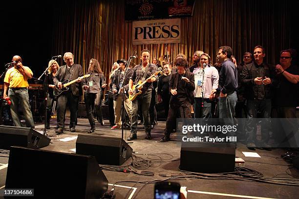 Bruce Springsteen performs with Willie Nile, Garland Jeffreys, John Eddie, and Joe Grushecky and the Houserockers during the 2012 Light of Day...