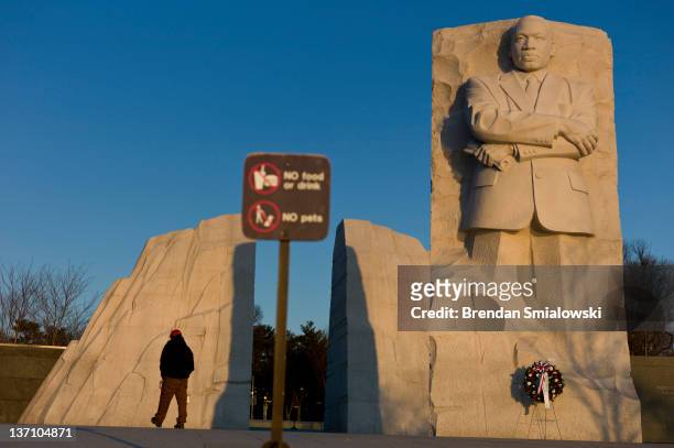 Man walks past the Martin Luther King Jr. Memorial on the National Mall January 15, 2012 in Washington, DC. Martin Luther King III and others joined...