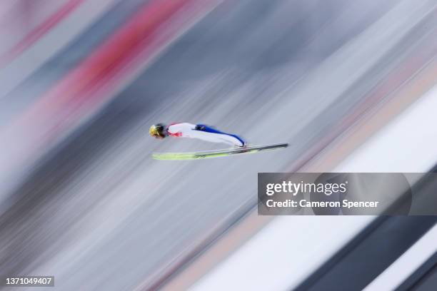 Martin Fritz of Team Austria competes during the Ski Jumping First Round as part of Biathlon Team Gundersen Large Hill/4x5km event on Day 13 of 2022...