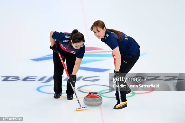 Kim Seon-yeong and Kim Cho-hi of Team South Korea compete against Team Sweden during the Women’s Curling Round Robin Session on Day 13 of the Beijing...