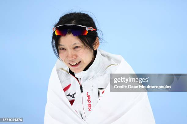 Miho Takagi of Team Japan celebrates after winning the Gold medal in a new Olympic record time of 1:13.19 during the Women's 1000m on day thirteen of...