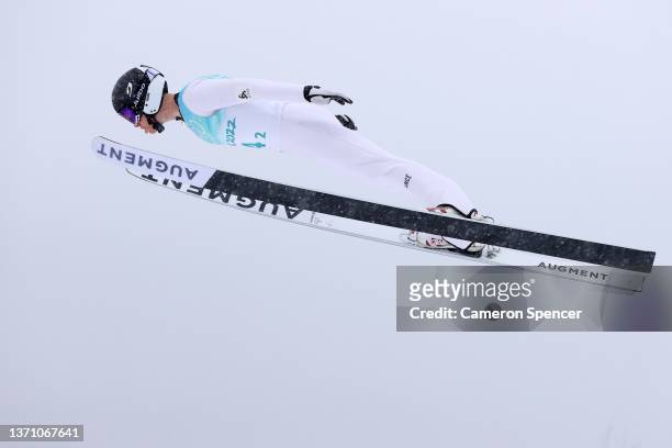 Gael Blondeau of Team France competes during the Ski Jumping First Round as part of Biathlon Team Gundersen Large Hill/4x5km event on Day 13 of 2022...