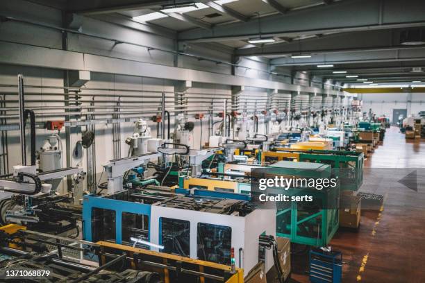 view of empty factory with electronics industry manufacturing equipments - injection molding stock pictures, royalty-free photos & images