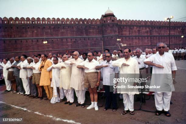 Jan Sangh leaders Lal Krishna Advani, KN Sahni, Madan lal Khurana, Vijay Kumar Malhotra stand in a line up at RSS Rally in New Delhi, c 1977.