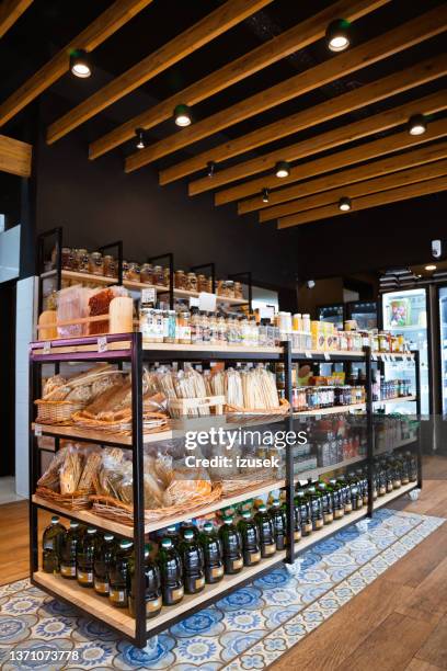 food and drink merchandise on display in rack - corner shop stock pictures, royalty-free photos & images