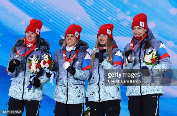 Silver Medallists Irina Kazakevich, Kristina Reztsova, Svetlana Mironova and Uliana Nigmatullina of Team ROC pose with their medals during the...