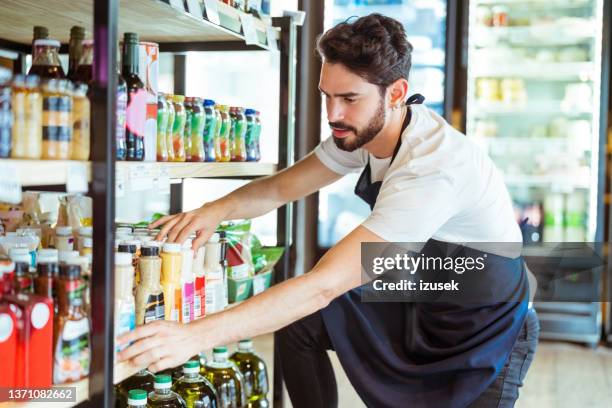 Man Clothes Rack Photos and Premium High Res Pictures - Getty Images