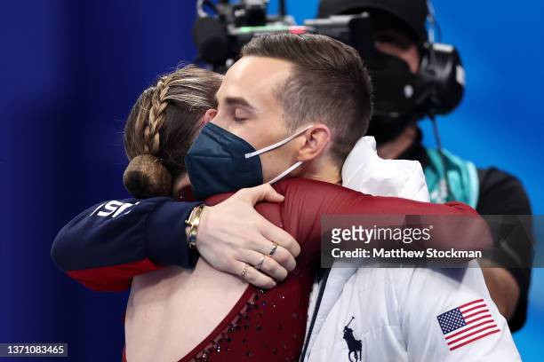 Mariah Bell of Team United States reacts with coach Adam Rippon after skating during the Women Single Skating Free Skating on day thirteen of the...