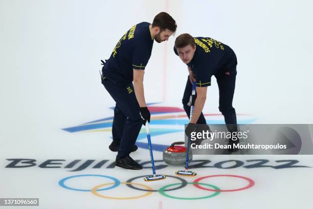 Oskar Eriksson and Christoffer Sundgren of Team Sweden compete against Team Canada during the Men’s Semifinal on Day 13 of the Beijing 2022 Winter...