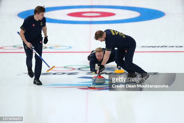 Christoffer Sundgren, Niklas Edin and Rasmus Wranaa of Team Sweden compete against Team Canada during the Men’s Semifinal on Day 13 of the Beijing...