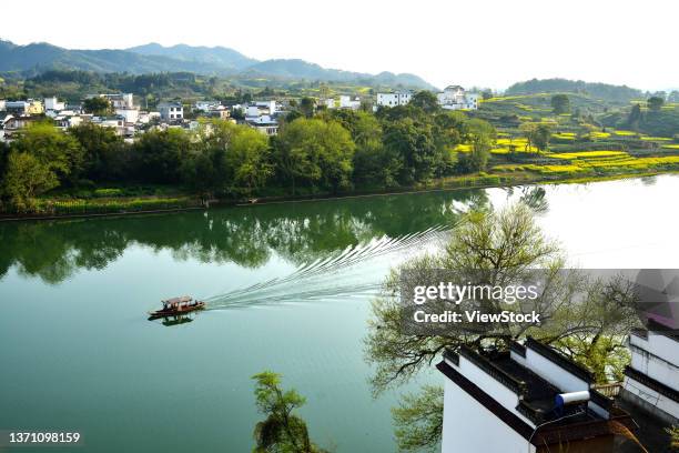 rapidly huangshan city in anhui province and the xinan river - huangshan city anhui province stock pictures, royalty-free photos & images