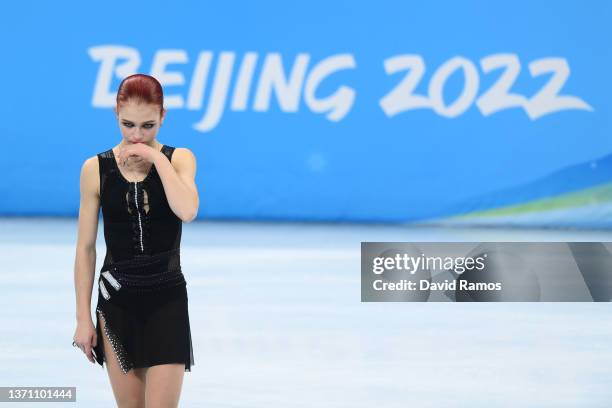 Silver Medallist Alexandra Trusova of Team ROC reacts during the Women Single Skating Free Skating flower ceremony on day thirteen of the Beijing...