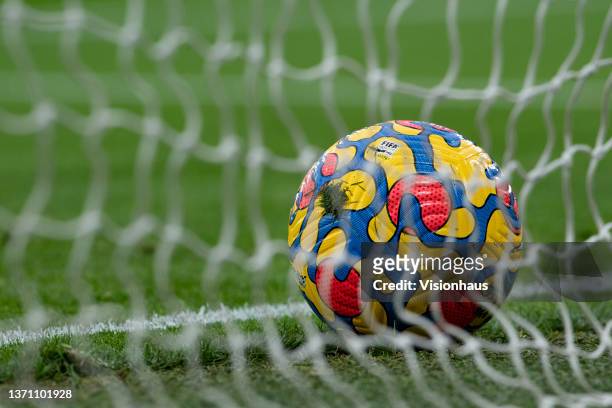 The official Premier League match ball by Nike in the goal net before the Premier League match between Manchester United and Southampton at Old...