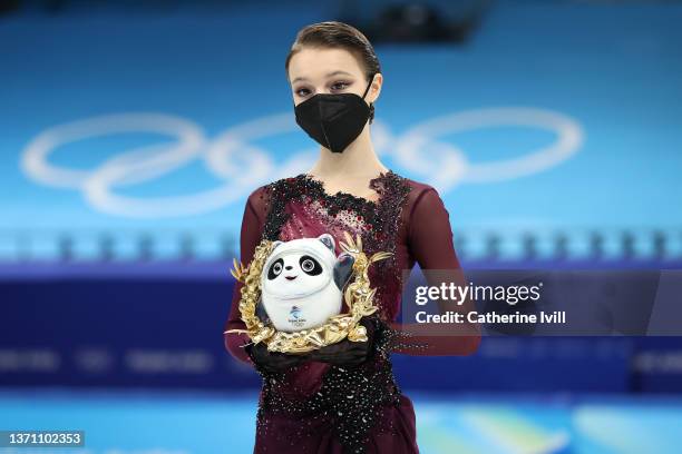 Gold medallist Anna Shcherbakova of Team ROC poses during the Women Single Skating Free Skating flower ceremony on day thirteen of the Beijing 2022...