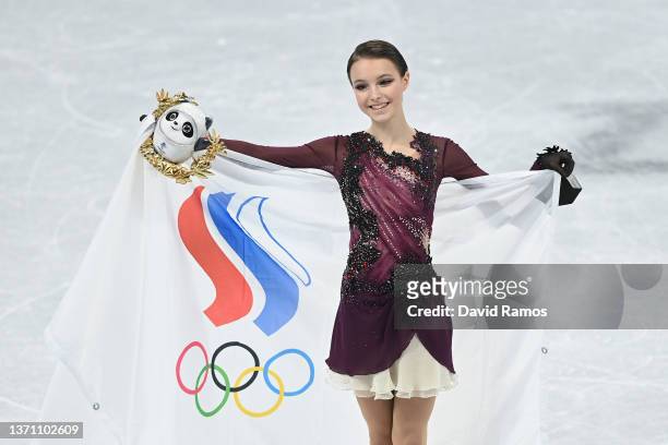 Gold medallist Anna Shcherbakova of Team ROC celebrates during the Women Single Skating Free Skating flower ceremony on day thirteen of the Beijing...