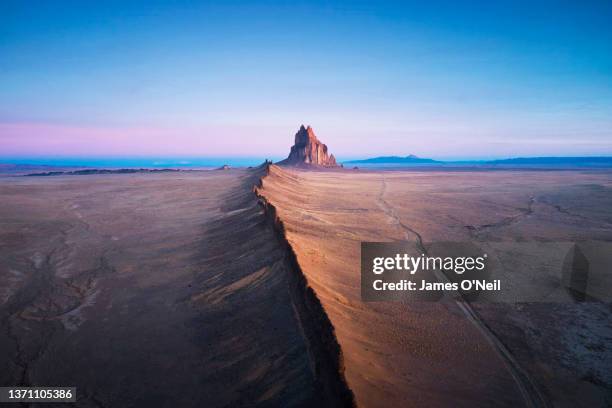 aerial view of ship rock at sunrise, new mexico, united states - shiprock fotografías e imágenes de stock