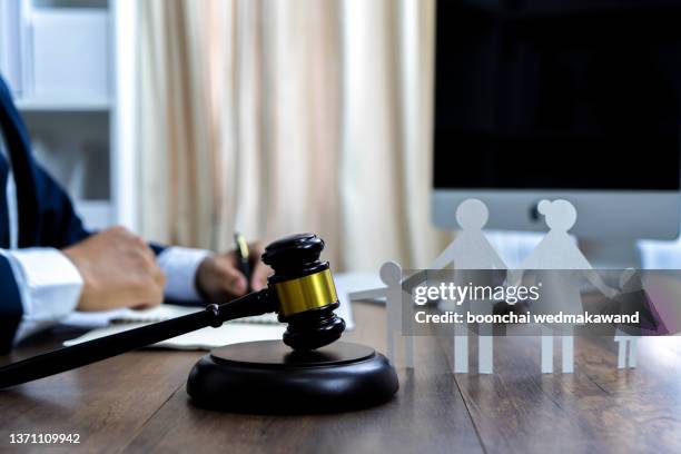 family paper and judge gavel. - family law stock pictures, royalty-free photos & images