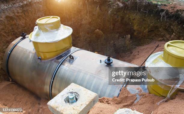 underground oil tank - oil tank fotografías e imágenes de stock