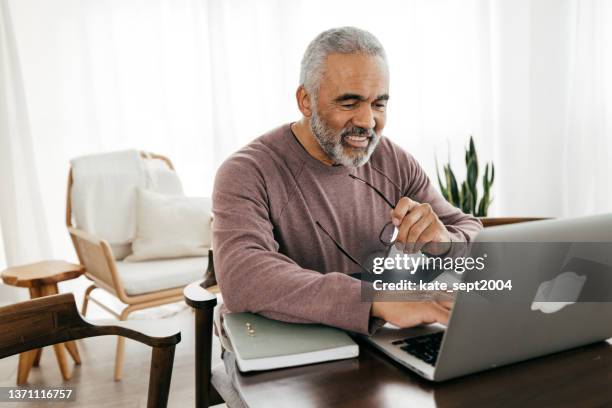 a budgeting app can be a great tool to help you meet your goals - retirement income stock pictures, royalty-free photos & images