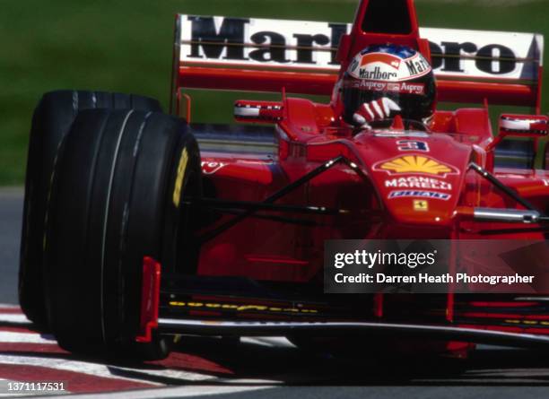 Michael Schumacher of Germany drives the Scuderia Ferrari Marlboro Ferrari F300 Ferrari V10 during practice for the Formula One Canadian Grand Prix...