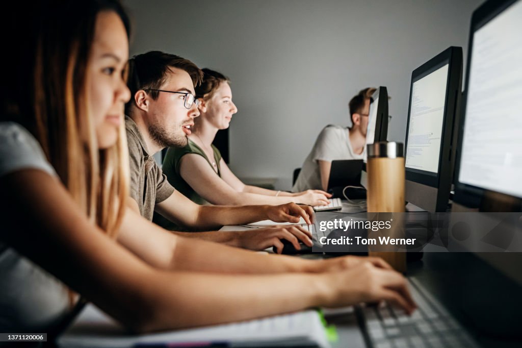 Working In College Students Working At Computer In College High-Res Stock Photo - Getty Images