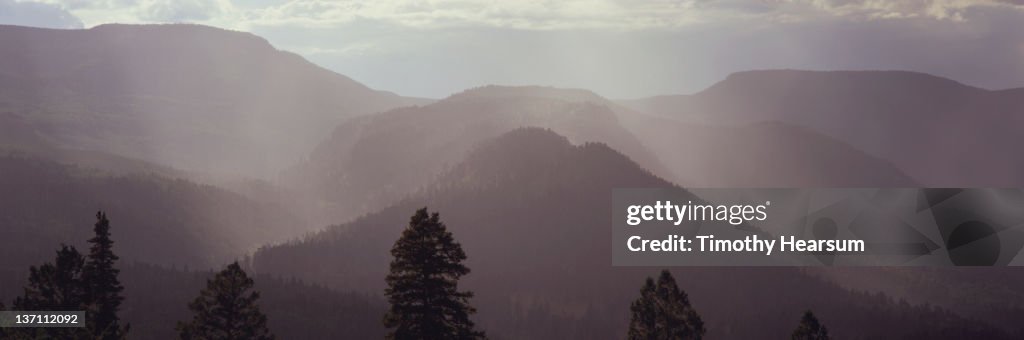 Rain, mist and sunshine in mountains