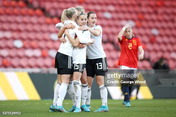 Lea Schueller of Germany celebrates with team mates after scoring their side's first goal during the Arnold Clark Cup match between Germany and Spain...