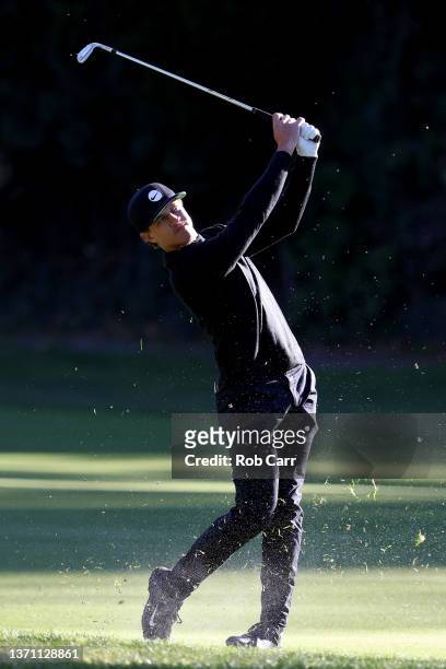 Cameron Champ of the United States plays a second shot on the 12th hole during the first round of The Genesis Invitational at Riviera Country Club on...