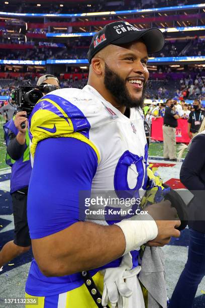 Aaron Donald of the Los Angeles Rams celebrates after defeating the Cincinnati Bengals during Super Bowl LVI at SoFi Stadium on February 13, 2022 in...