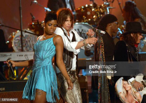 Fantasia and Steve Tyler perform during the Grammy Awards Show, February 8, 2006 in Los Angeles, California.