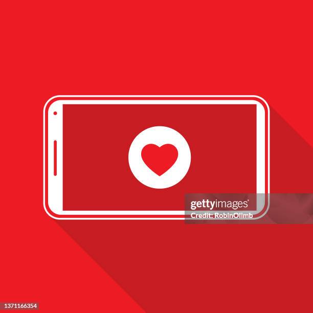 red playbutton heart smart phone icon - white play button stock illustrations