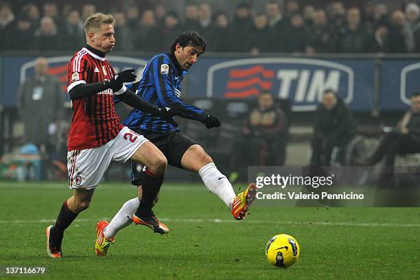 Diego Milito of FC Internazionale Milano scores the opening goal during the Serie A match between AC Milan and FC Internazionale Milano at Stadio...