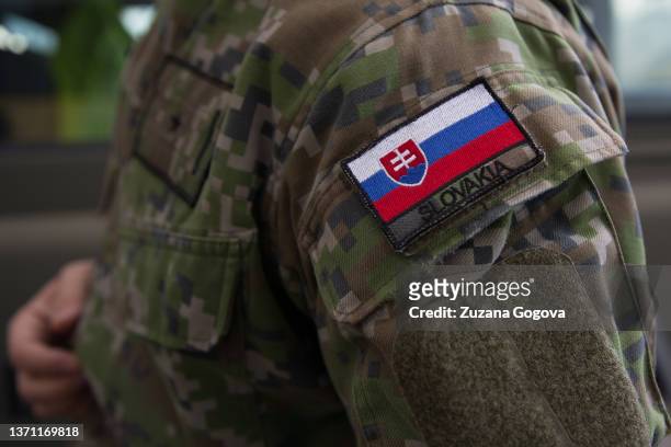 Insignia is seen on the arm of a member of the Slovak military police on February 17, 2022 in Kuchyna, Slovakia. Allied armed forces will present...