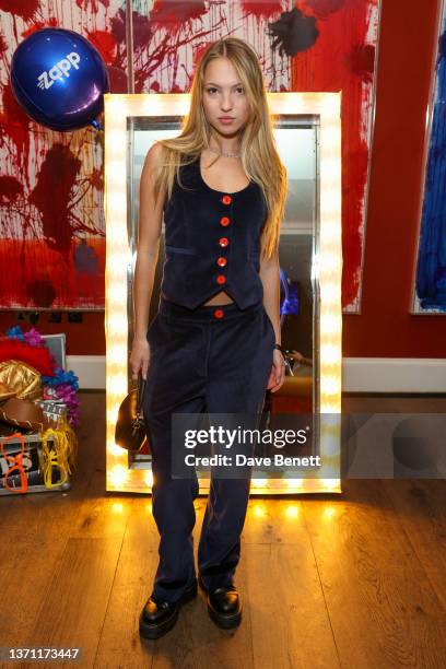 Lila Moss attends the Zapp sponsored Fashion Week party hosted by Gstaad guy on February 17, 2022 in London, England.