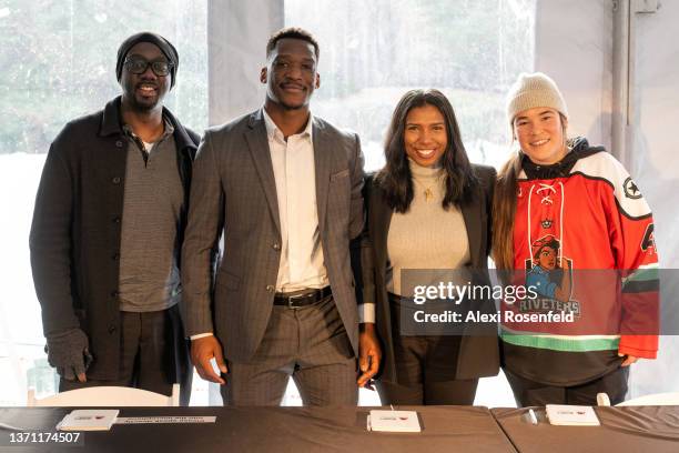 Anson Carter, Boko Imama, Stefanie Tomlin and Kelly Babstock pose during the "Black Excellence and Joy in Hockey" Campaign at Wollman Rink, Central...