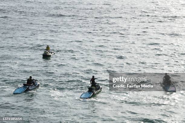 Police search the water at Little Bay, Sydney, the day after 35-year-old Simon Nellist was killed in a shark attack, February 17, 2022