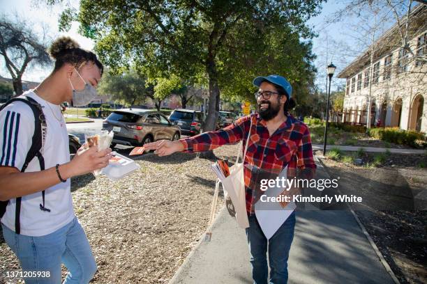 Stanford students hand out information on boycotting employment by Facebook and Google at Stanford University on February 17, 2022 in Stanford,...