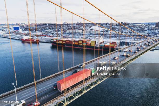 container ship below - halifax harbour stock pictures, royalty-free photos & images