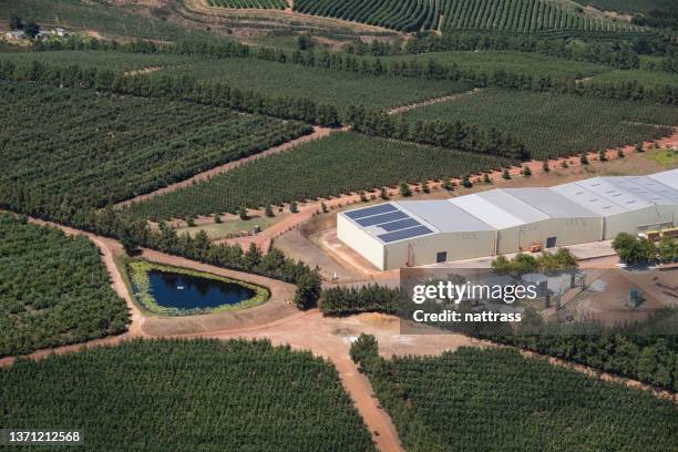 aerial shot of a winery using solar energy - agricultural building stock pictures, royalty-free photos & images