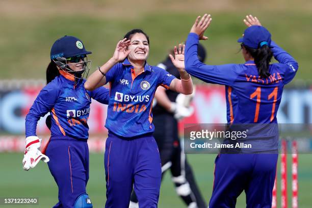 Indian players Renuka Singh Thakur celebrates a wicket during game three in the One Day International series between the New Zealand White Ferns and...