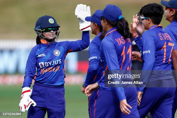 Indian wicket keeper Taniyaa Bhatia celebrates a wicket during game three in the One Day International series between the New Zealand White Ferns and...