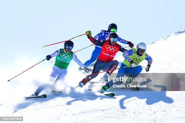 Sergey Ridzik of Team ROC, Brady Leman of Team Canada, Kirill Sysoev of Team ROC and David Mobaerg of Team Sweden compete during the Men's Ski Cross...