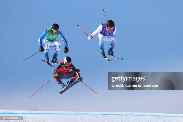 Francois Place of Team France, Jared Schmidt of Team Canada and Erik Mobaerg of Team Sweden compete during the Men's Ski Cross Quarterfinals on Day...